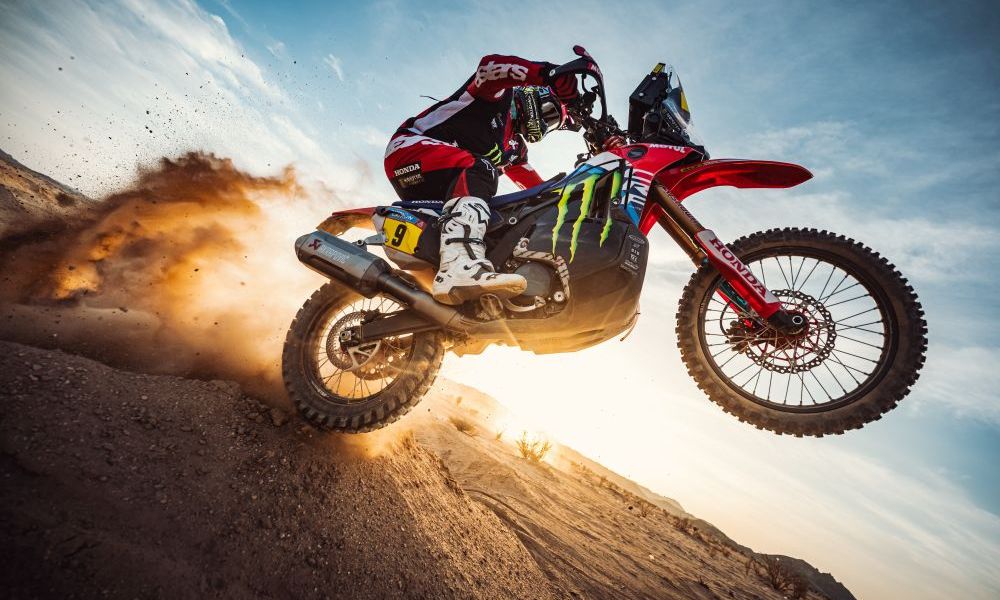 Motocross rider jumping on dirt bike