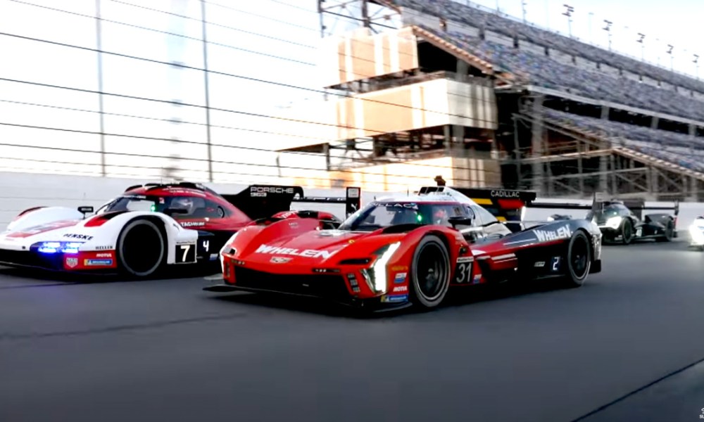 Three IndyCars racing on track