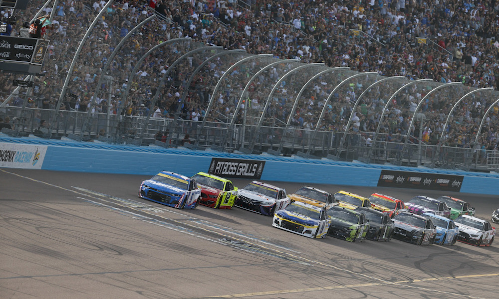 NASCAR cars racing at Phoenix Raceway