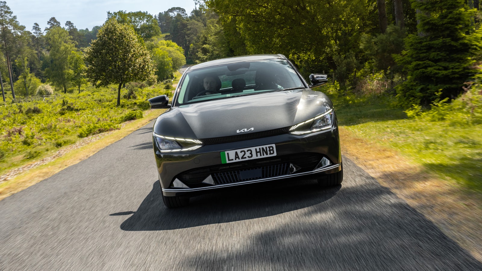 Kia EV6 driving on rural road