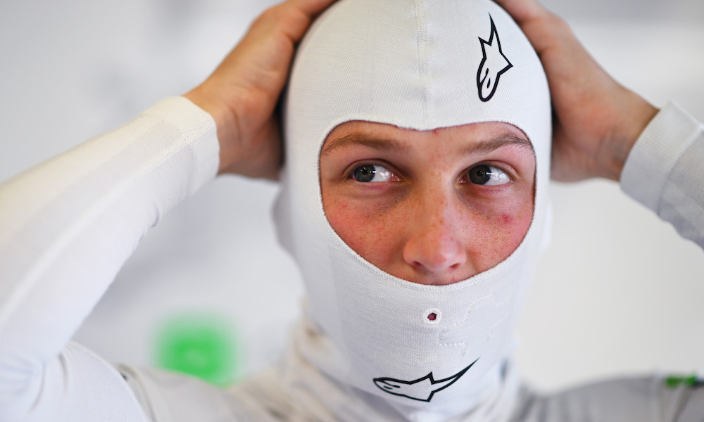 Racing driver wearing white Nomex balaclava