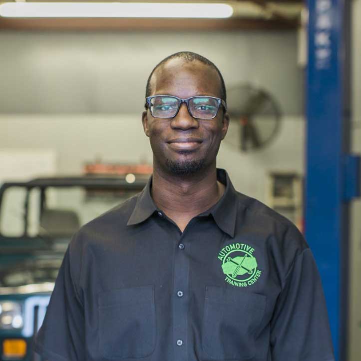 Auto mechanic in black shirt