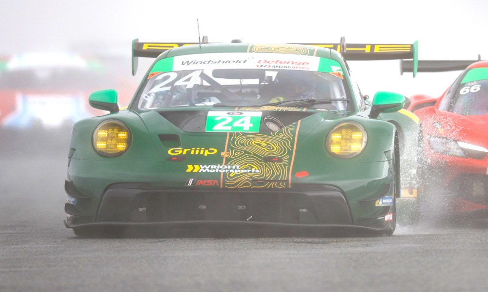 Green and yellow racing car speeding