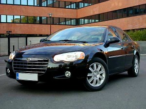 Black Chrysler Sebring in parking lot