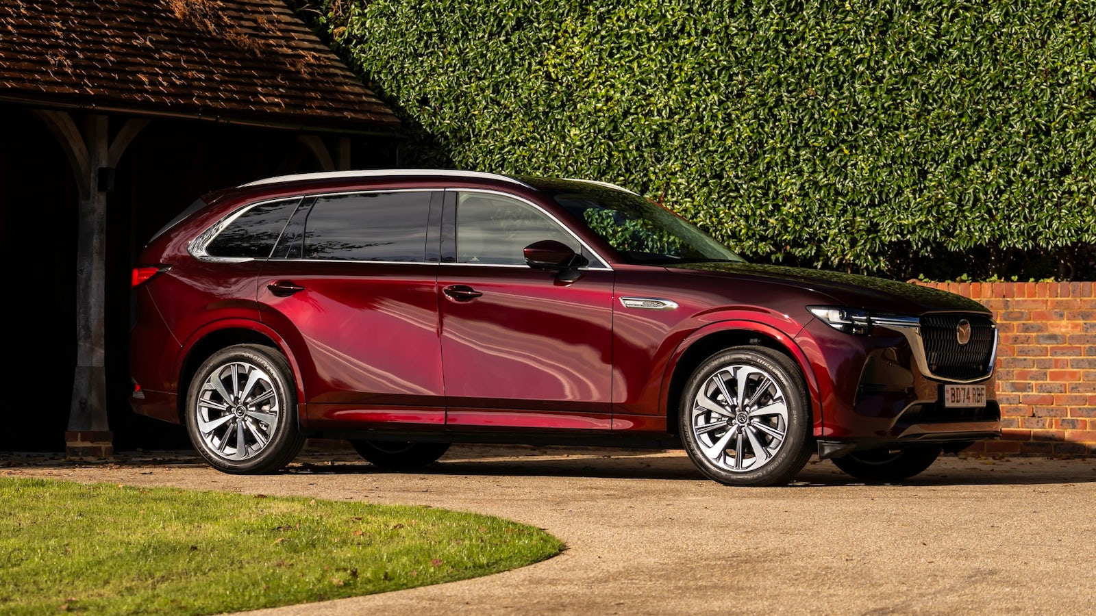 Red Mazda CX-80 parked outdoors