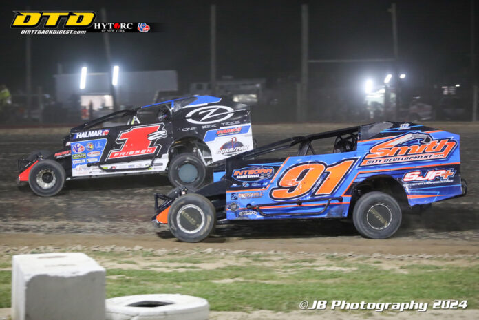 Sprint cars racing on dirt