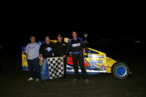 Four racers at Brighton dirt track