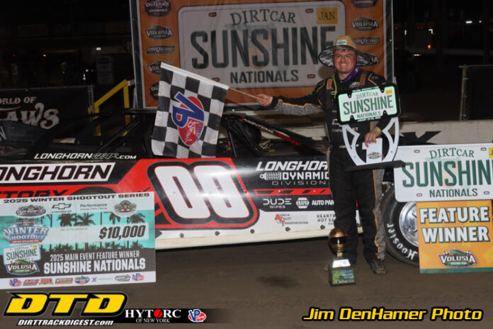 Ethan Wilson celebrates dirt track victory