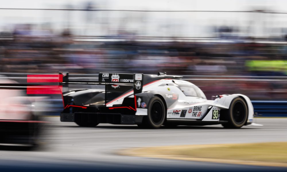 Race car speeding on track