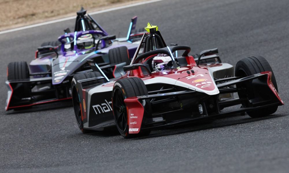 Two cars racing on COTA track