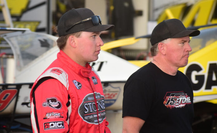 Two racers named Stone standing together