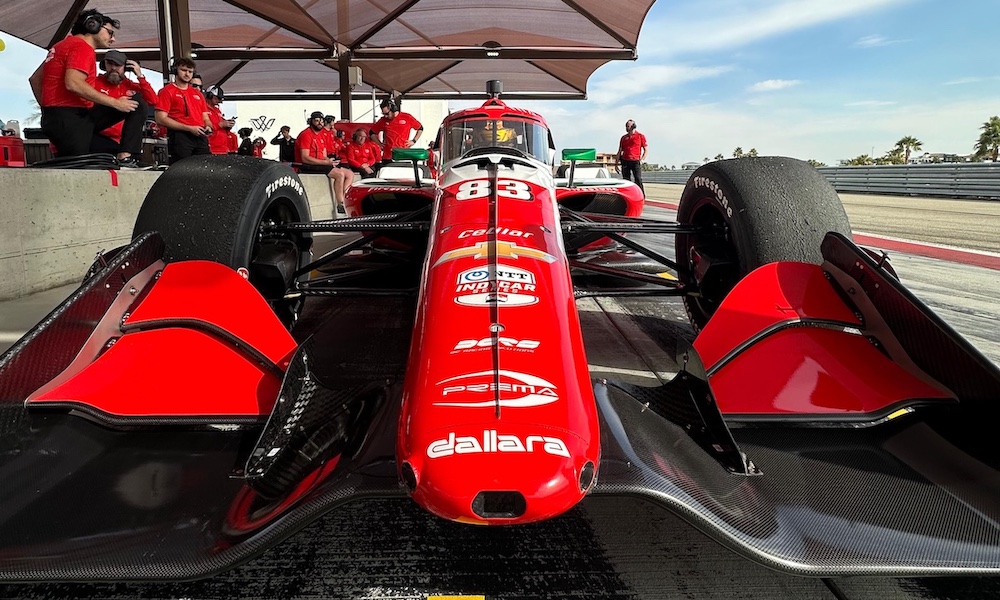 Red Ferrari races on track