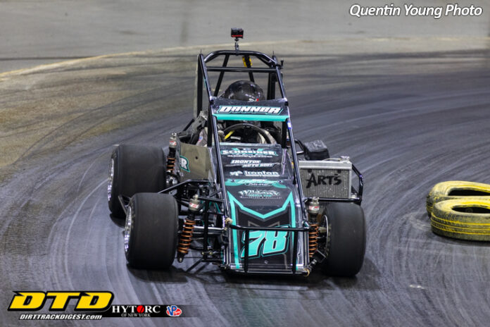 Sprint car racing on dirt track