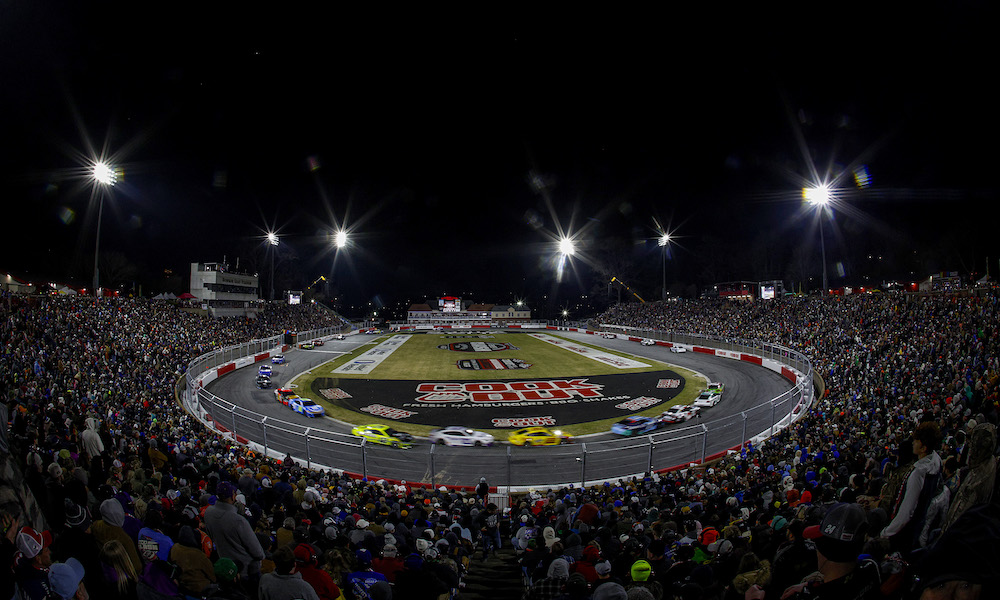 Crowd watching motorsport race from stands