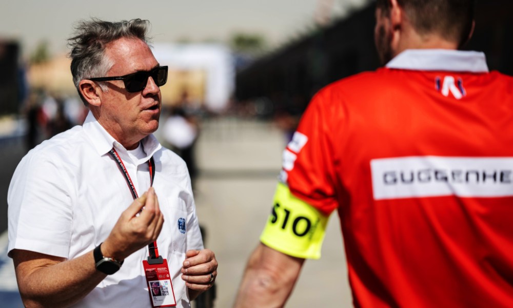 Two F1 drivers in racing uniforms