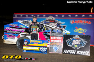 Race car driver with trophy display