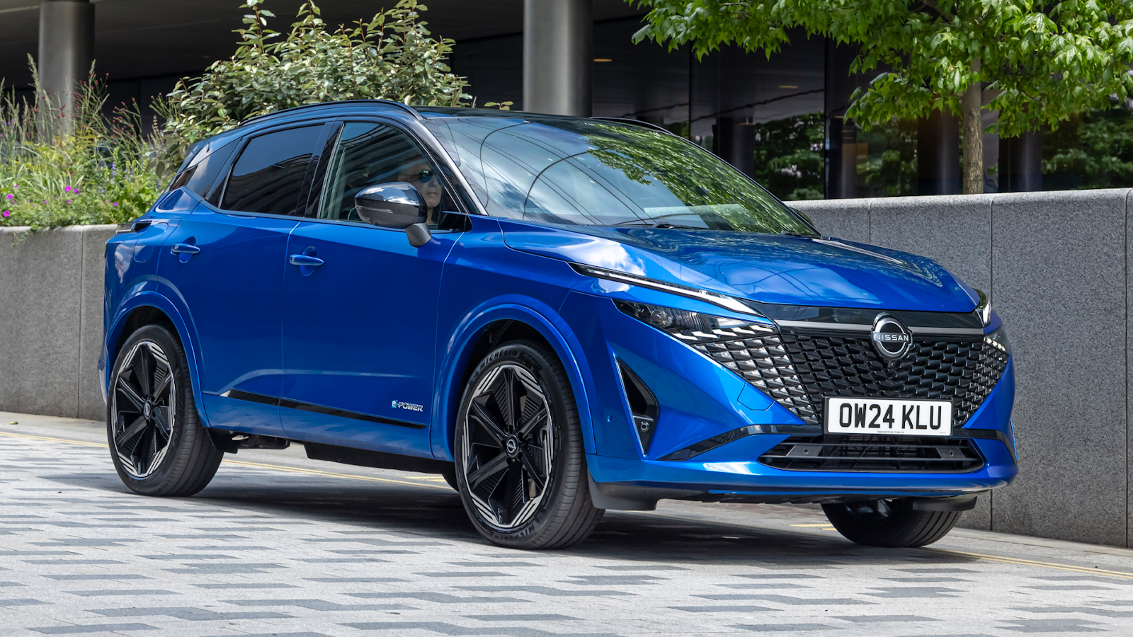 Blue Nissan Qashqai front view