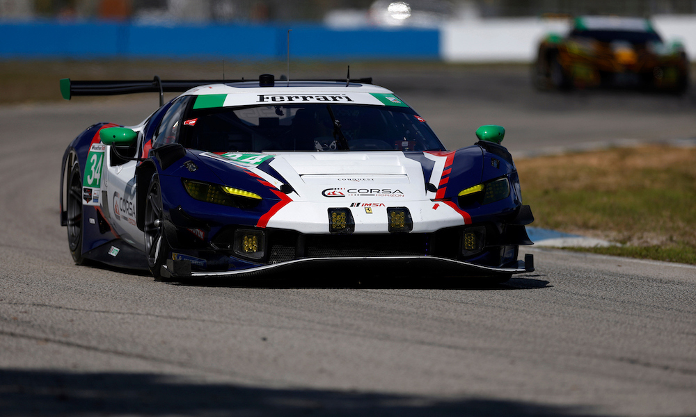 Red Ferrari racing at Sebring