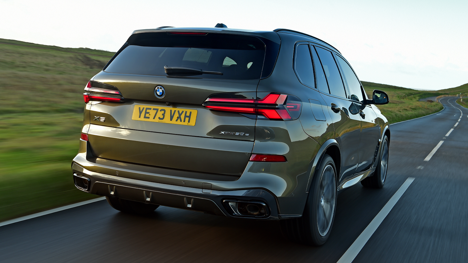 BMW X5 rear view on road