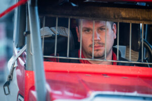 Race car driver in cockpit