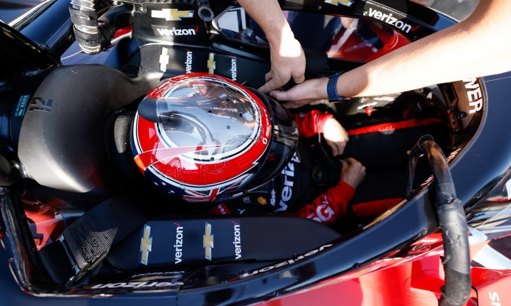 Racing helmet on car dashboard