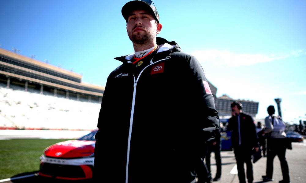 Racing driver in black jacket