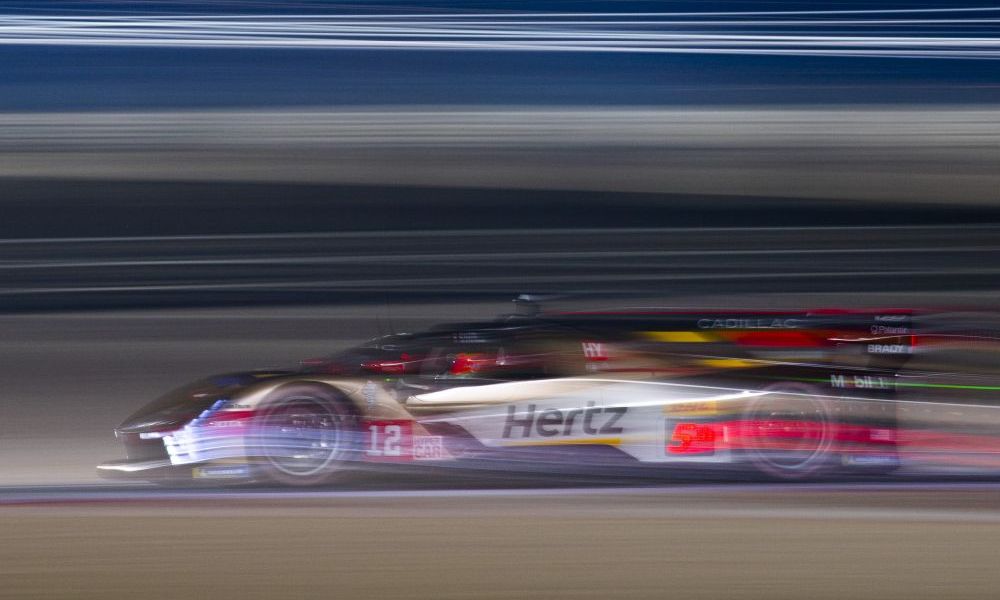 Two race cars competing on track