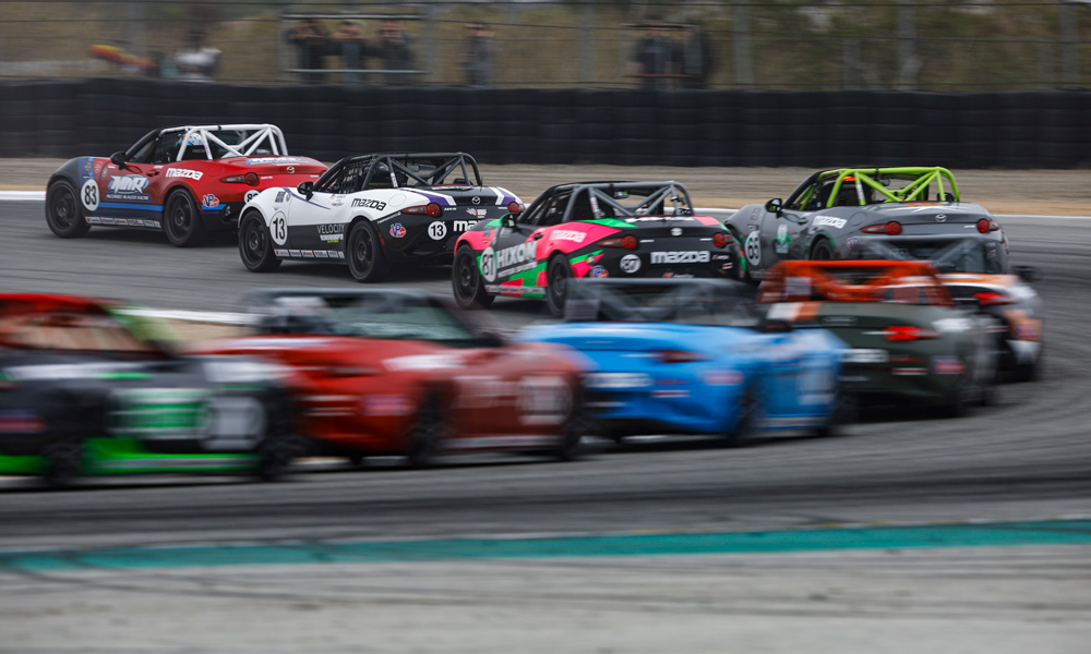 Mazda race cars competing on circuit