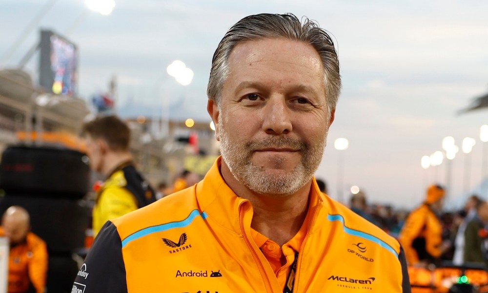 Racing driver in yellow suit