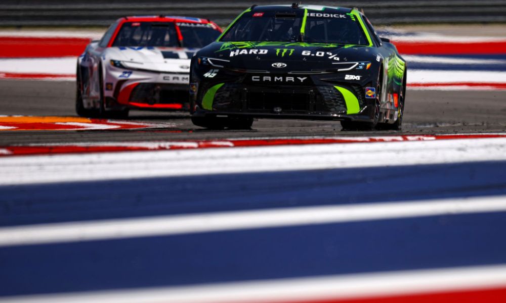 Two IndyCars race on track