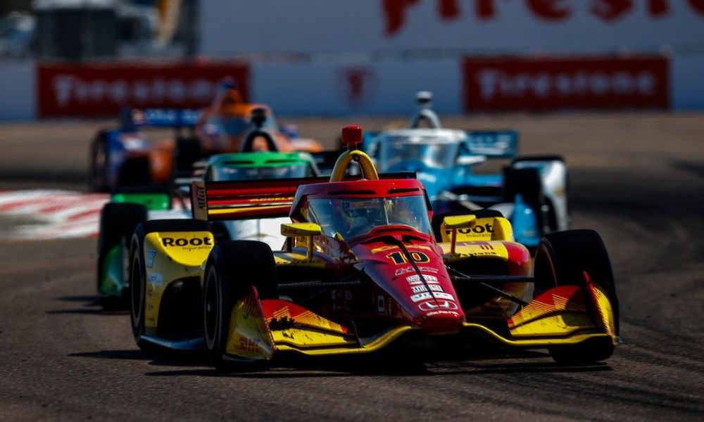 IndyCar race cars on track