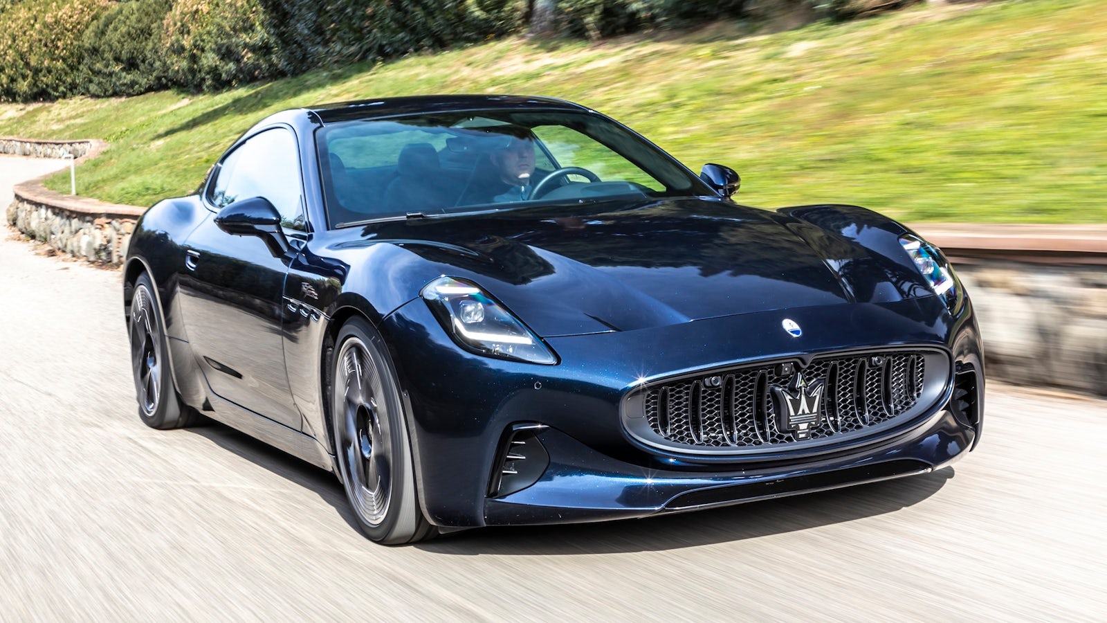 Black Maserati GranTurismo on road