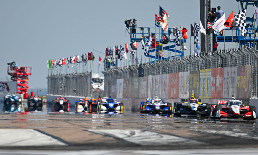 Race cars competing on speedway