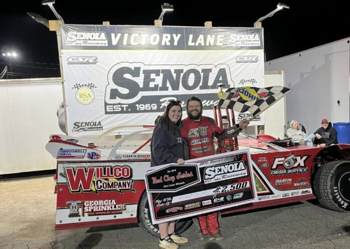 Three people celebrating race victory