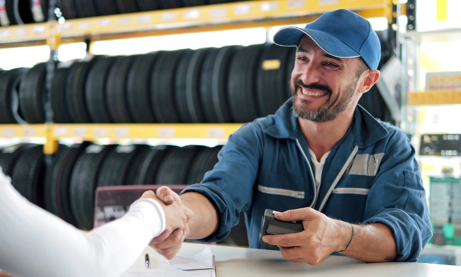 Man gives keys to car buyer