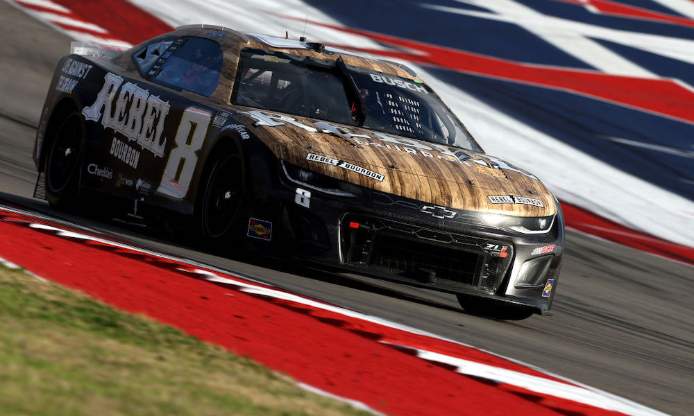 Black race car with wood trim