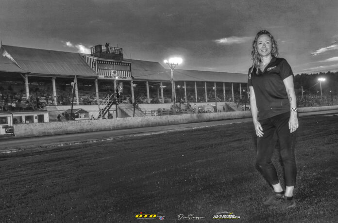 Woman on dirt race track