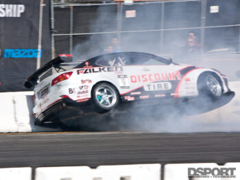 Racing car crashes into wall