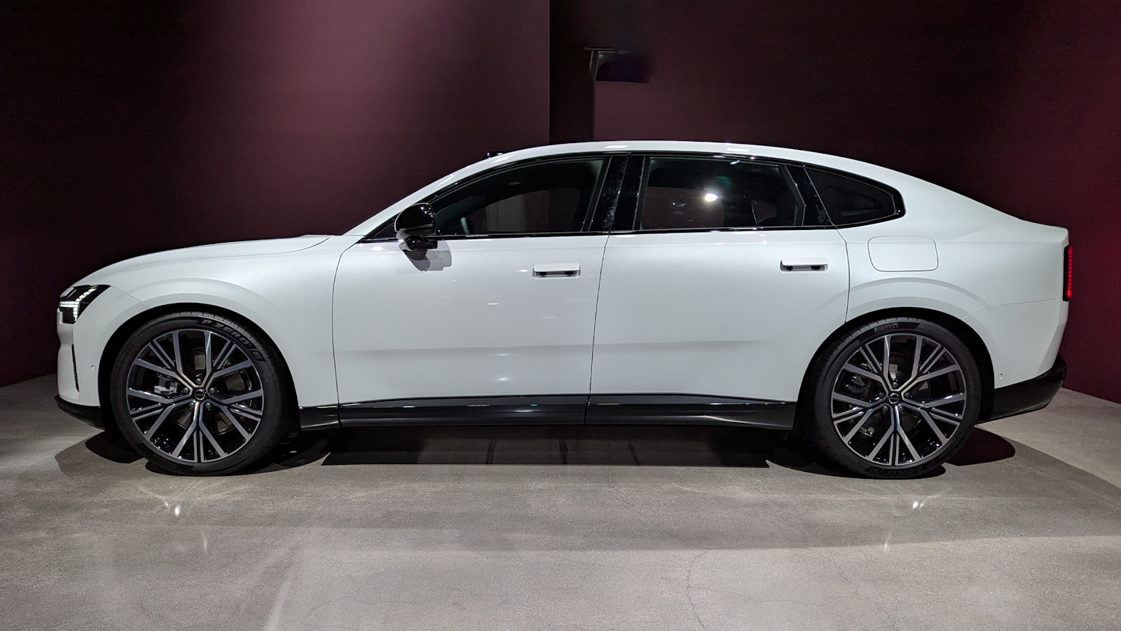 Gray Volvo ES90 sedan side view