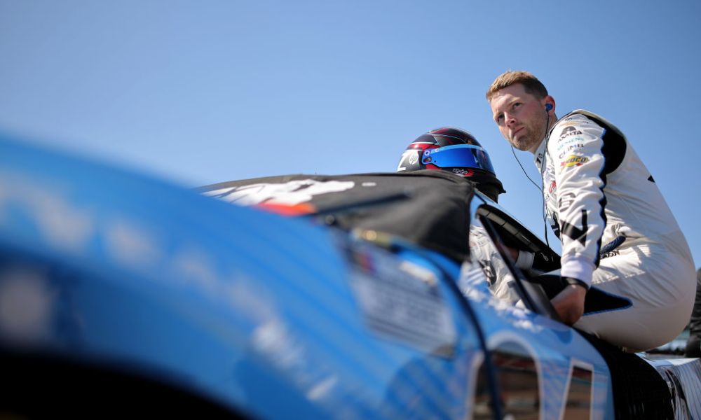 Race car driver in racing suit