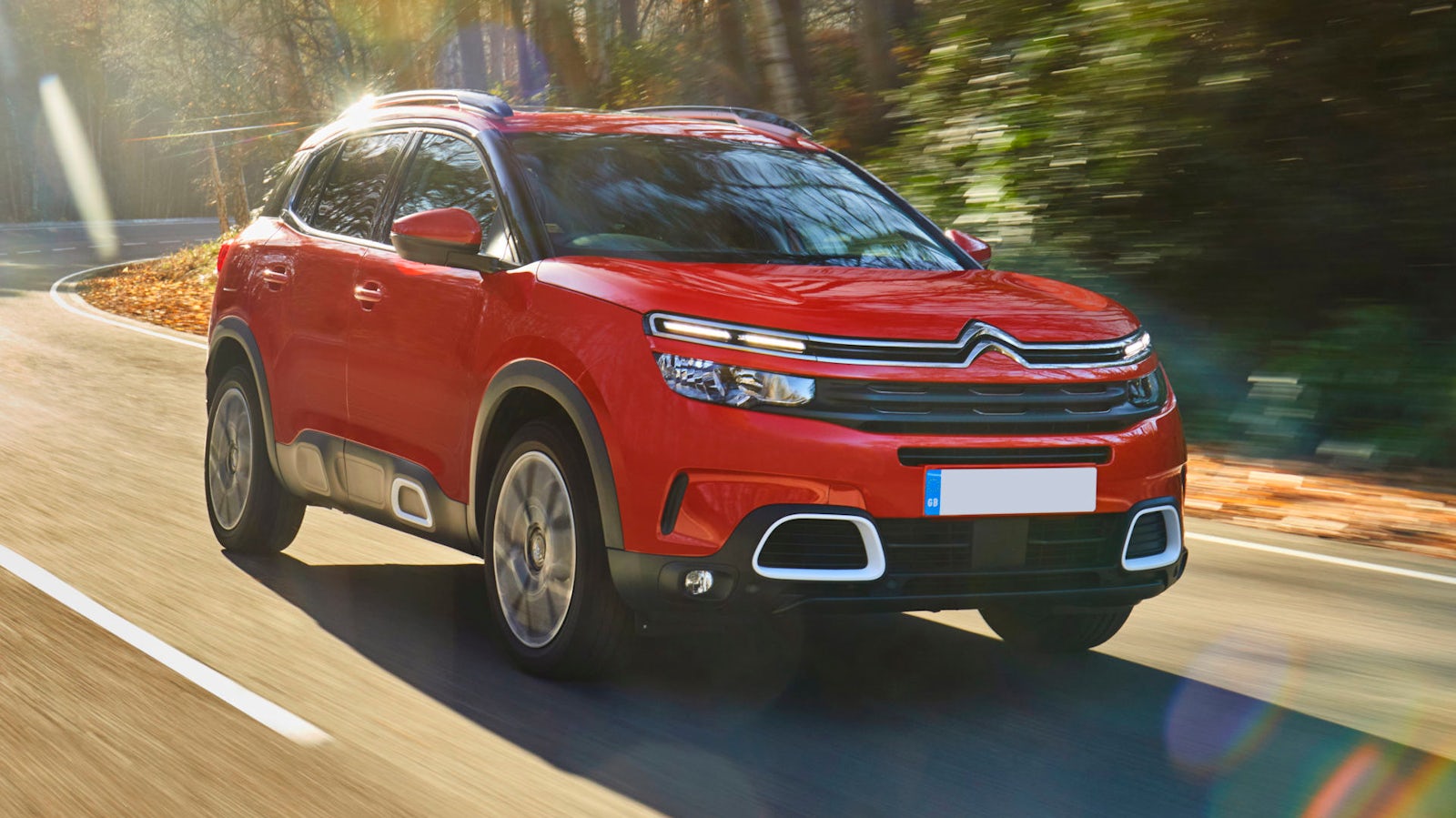 Red Citroen C5 Aircross driving front-view